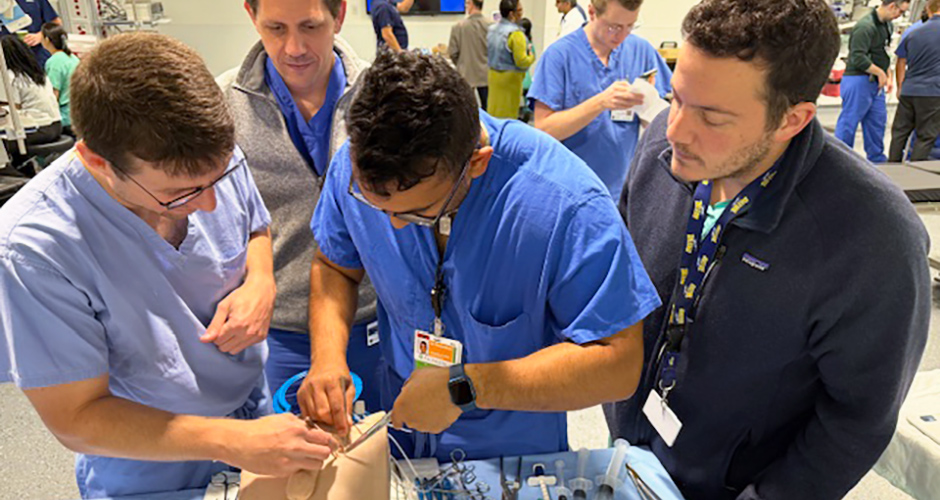 Residents working in the simulation center